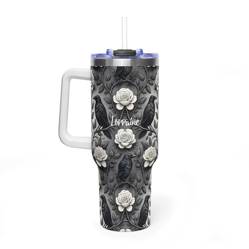 Insulated tumbler with a black lid and a clear straw. The tumbler has a black and gray floral and bird pattern with the name 'Lorraine' printed on it.