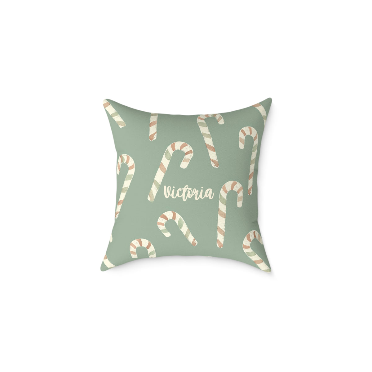 Personalized candy cane name pillow on sage green, product photo