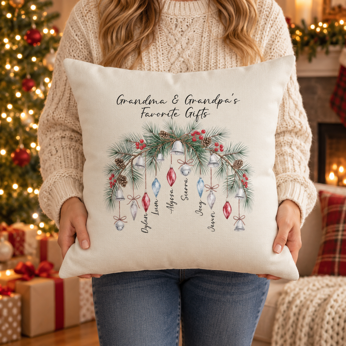 Person holding the personalized Grandma and Grandpa's Favorite Gifts ornament pillow