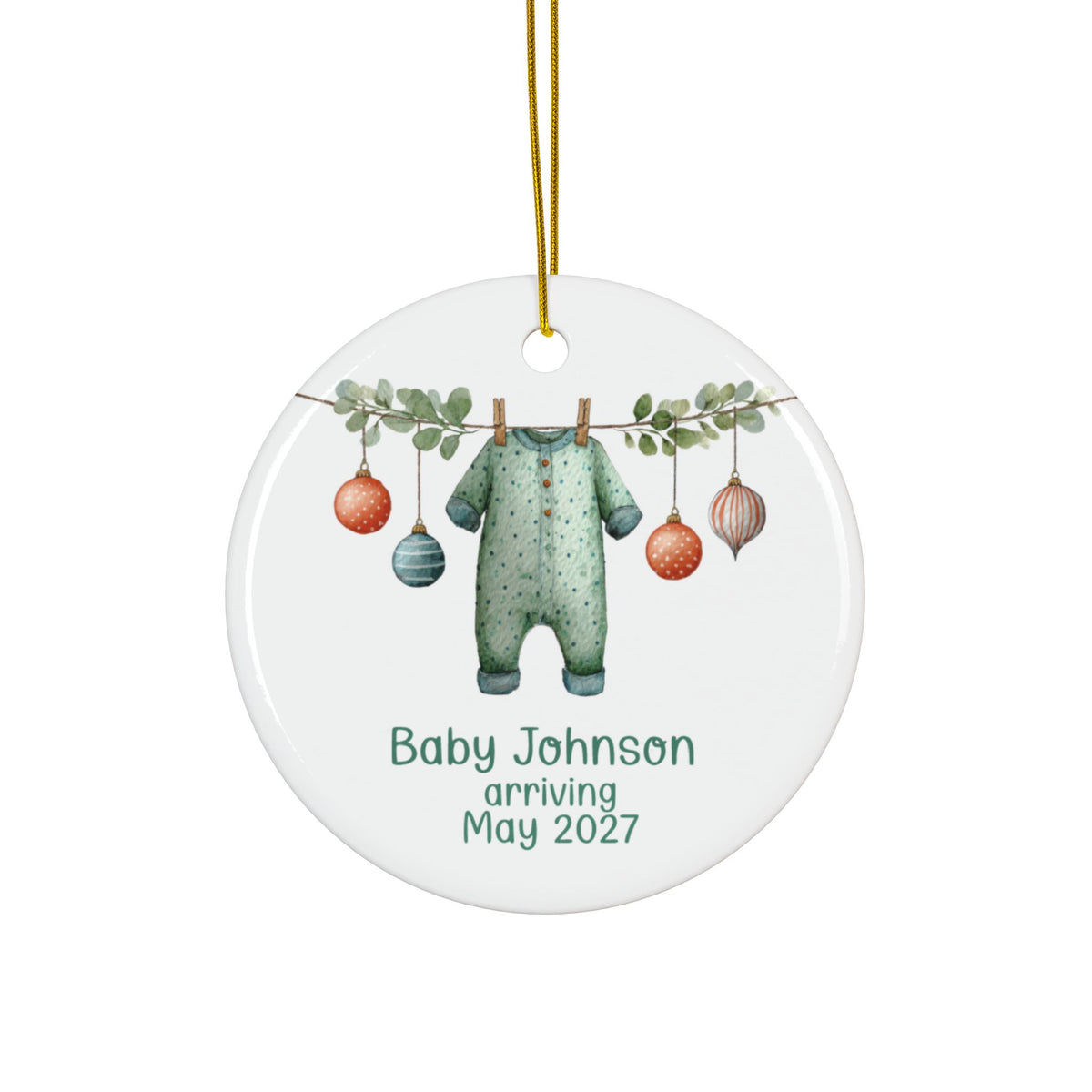 Personalized baby arriving Christmas ornament with green polka dot sleeper on a eucalyptus garland, family name and due date
