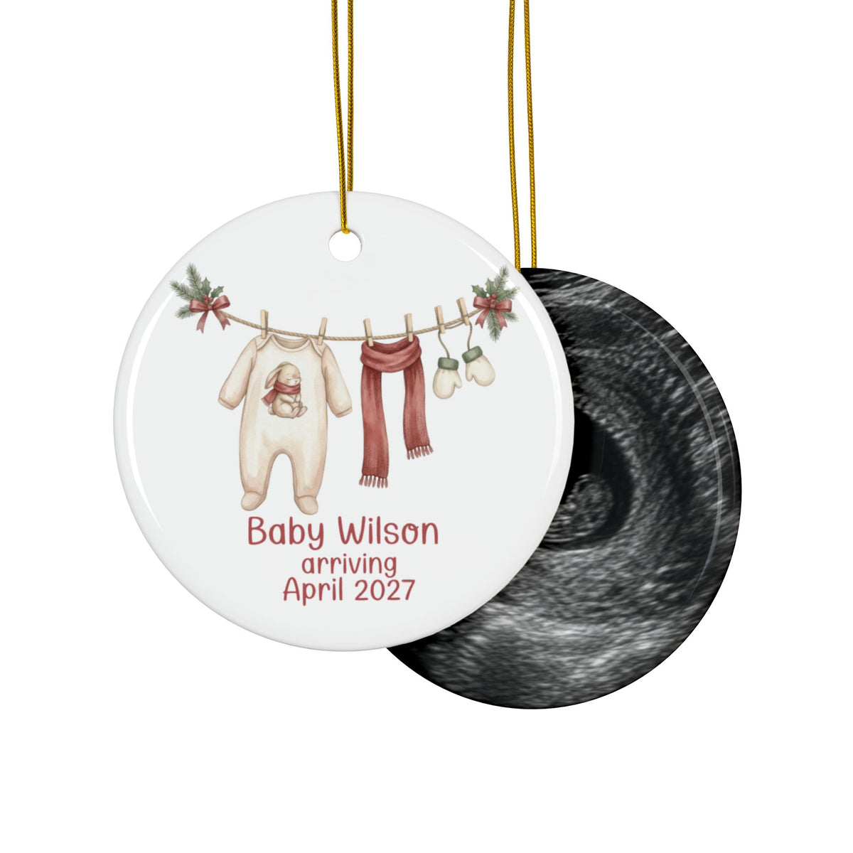 Double-sided baby arriving ornament with bunny sleeper, red scarf and mittens on the front and an ultrasound photo on the back