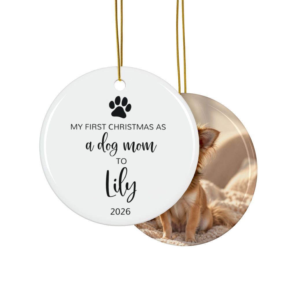 Front and back of the personalized dog mom first Christmas ornament with paw print and black script name, design and photo side