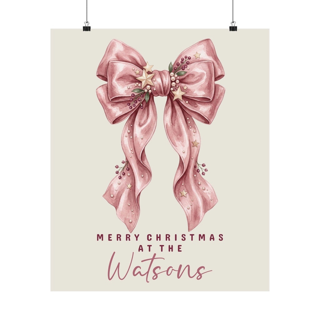 Unframed pink bow family Christmas poster hanging on a wall, print preview