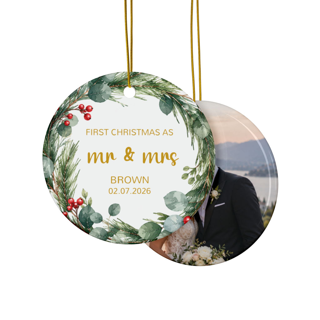 Front and back of the personalized First Christmas as Mr and Mrs ornament with pine and eucalyptus wreath, design and photo side