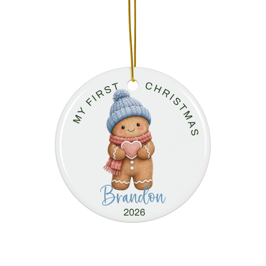 Personalized baby's first Christmas ornament with a gingerbread boy in a blue beanie, baby name and 2026
