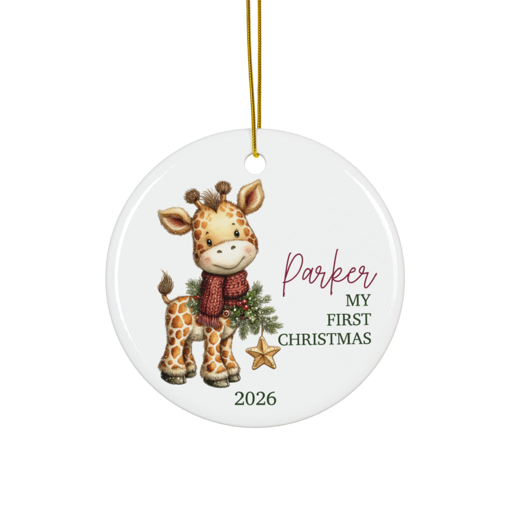 Personalized baby's first Christmas ornament with a baby giraffe in a red scarf and gold star, baby name and 2026