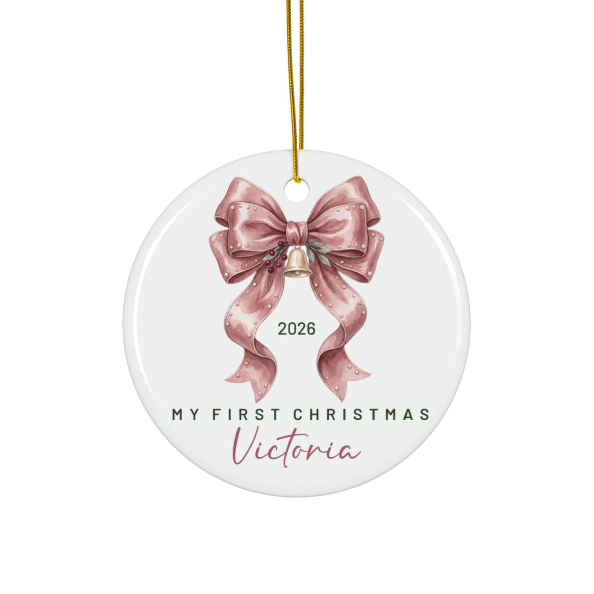 Personalized baby's first Christmas ornament with a dusty pink satin bow and bell, baby name and 2026