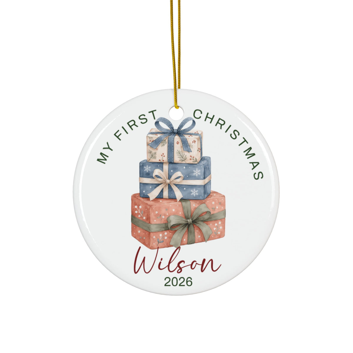 Personalized baby's first Christmas ornament with stacked gift boxes in blue and pink, baby name and 2026