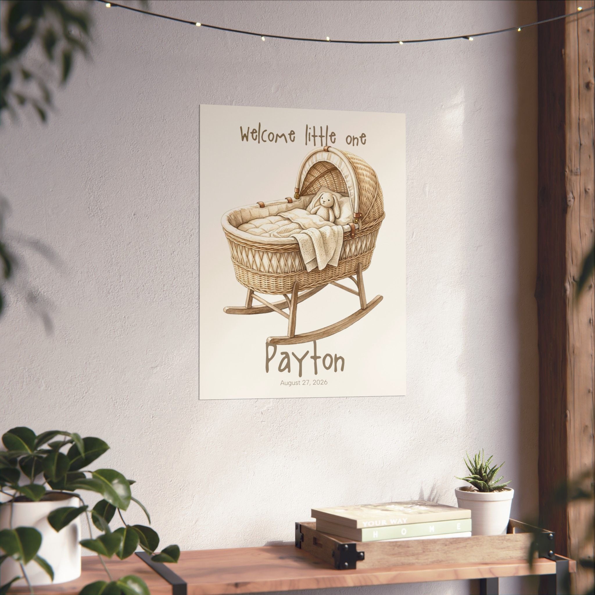Bassinet nursery art print on wall in baby room
