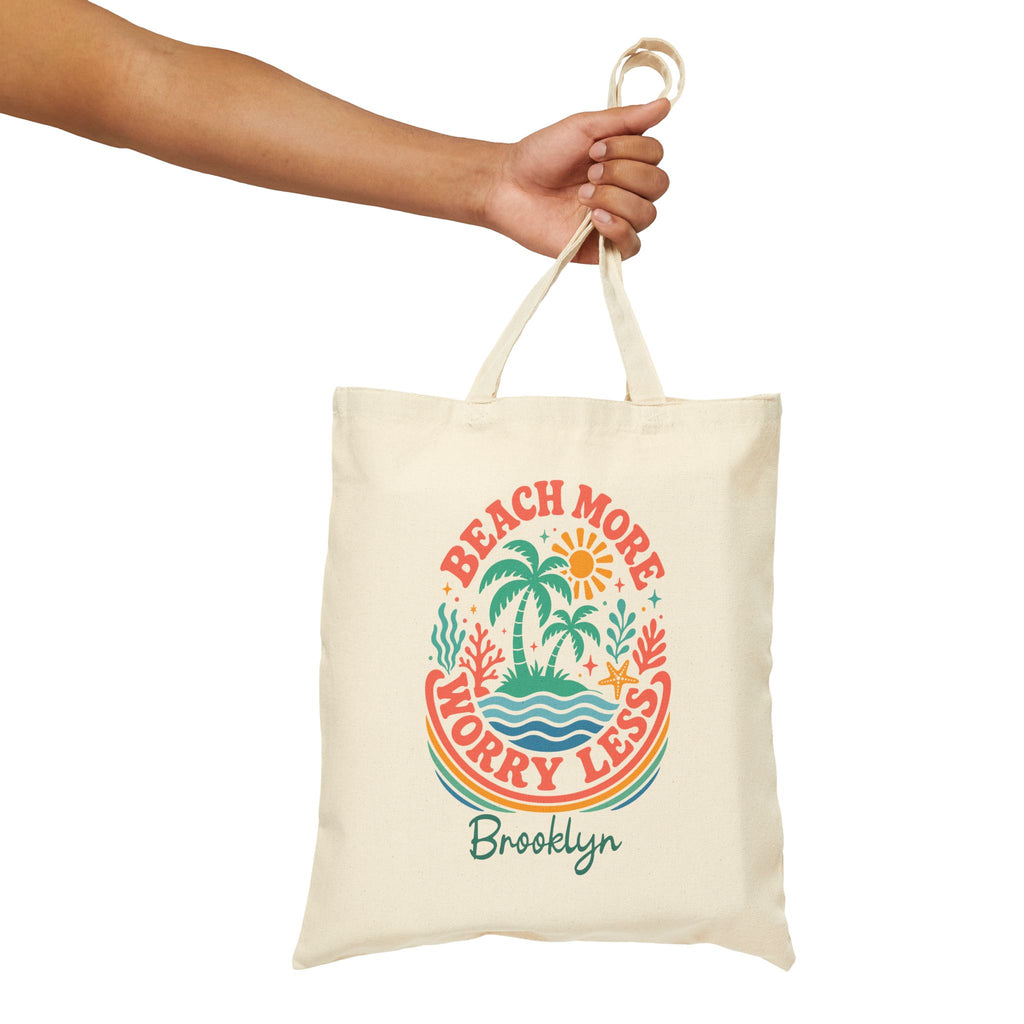Personalized beach more worry less canvas tote bag styled in a home setting
