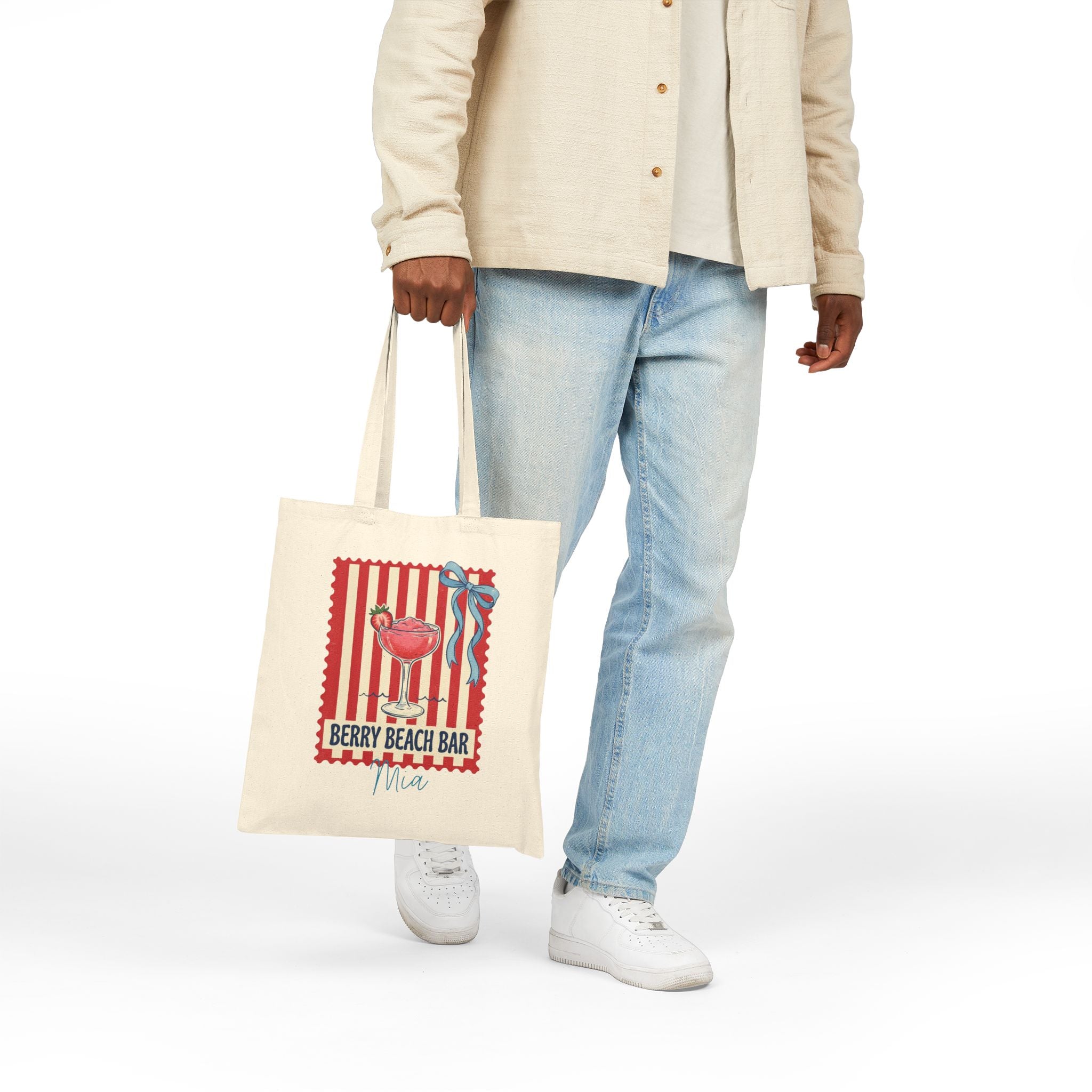 Personalized berry beach bar canvas tote bag styled in a home setting