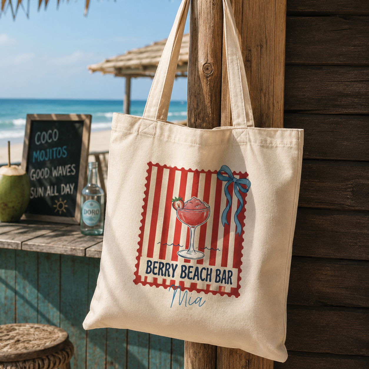 Personalized berry beach bar tote bag shown worn on shoulder, lifestyle photo