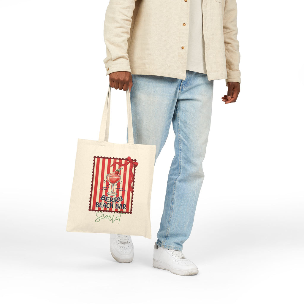 Personalized berry beach bar canvas tote bag styled in a home setting
