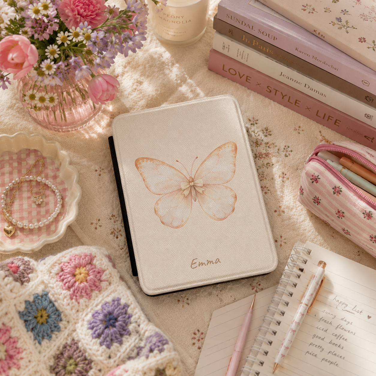 Personalized butterfly kindle case shown in a lifestyle setting