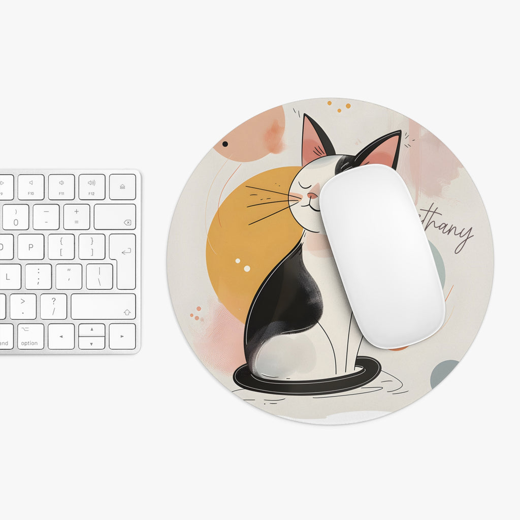 Personalized pastel geometric cat mouse pad shown at true size next to a keyboard