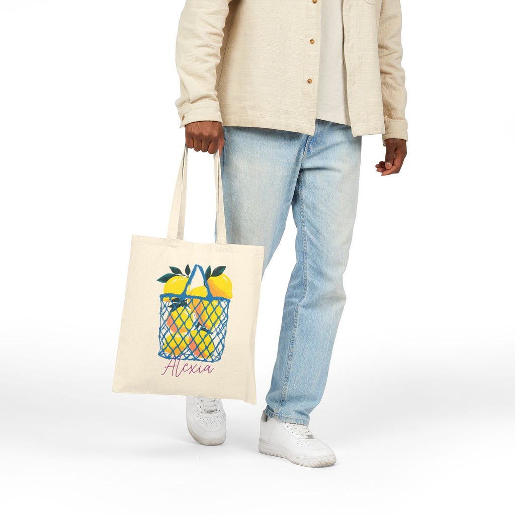 Personalized citrus basket canvas tote bag styled in a home setting