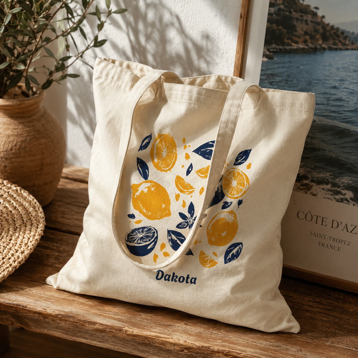 Close-up of citrus block print and custom name on canvas tote bag