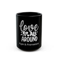 Personalized couples mug - Love is All Around in white hand-lettered typography on glossy black 15oz ceramic