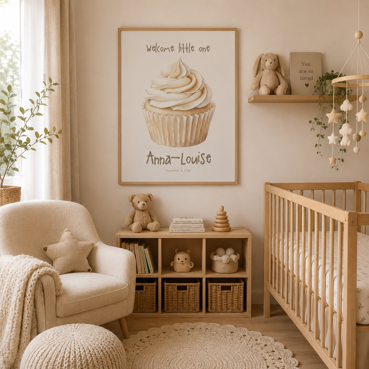Watercolor cupcake baby name poster displayed in nursery room