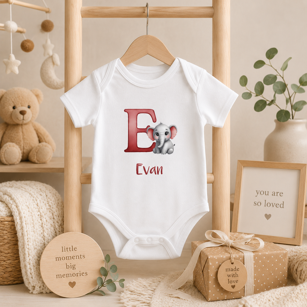 Initial E bodysuit with elephant and name in script – flat lay