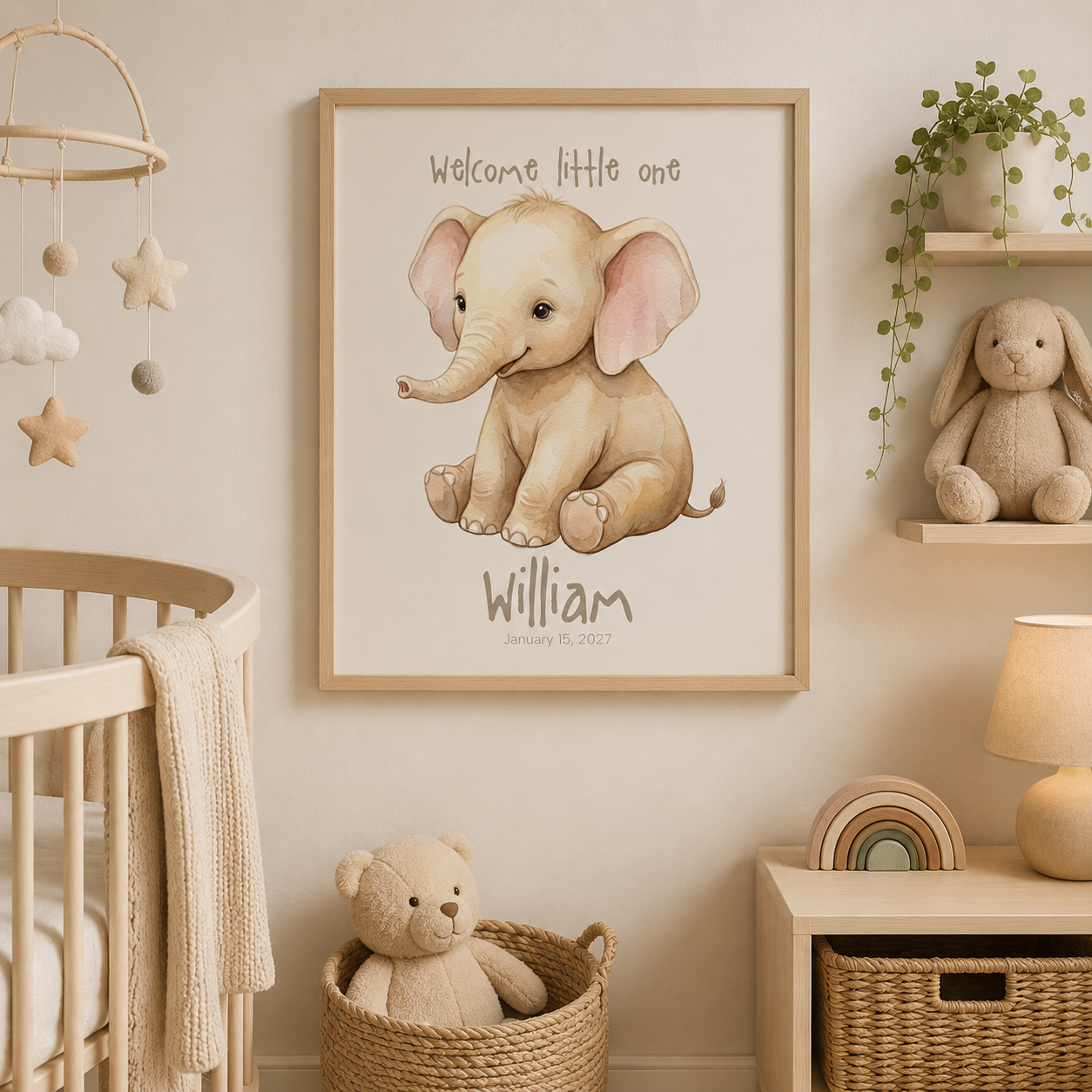 Close-up of elephant nursery poster showing personalized name and birth date