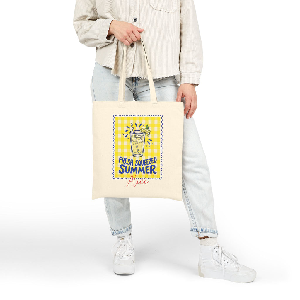 Personalized fresh squeezed summer canvas tote bag styled in a home setting
