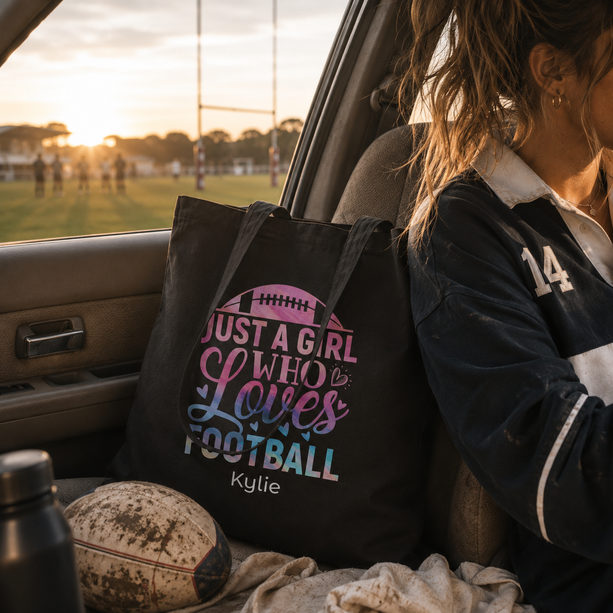 Personalized football tote bag shown worn on shoulder, lifestyle photo