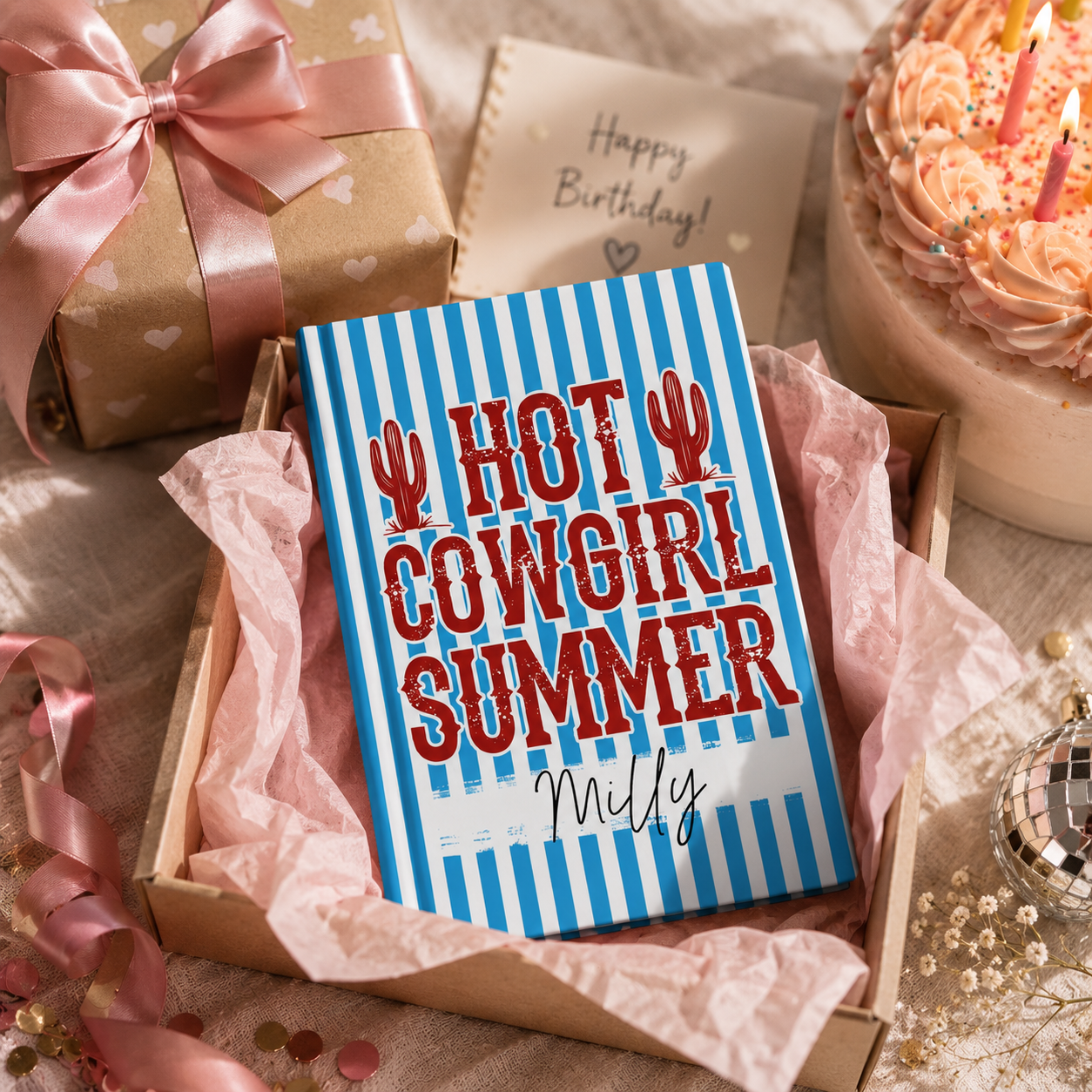 Personalized cowgirl journal lifestyle – blue stripe notebook on desk in summer setting