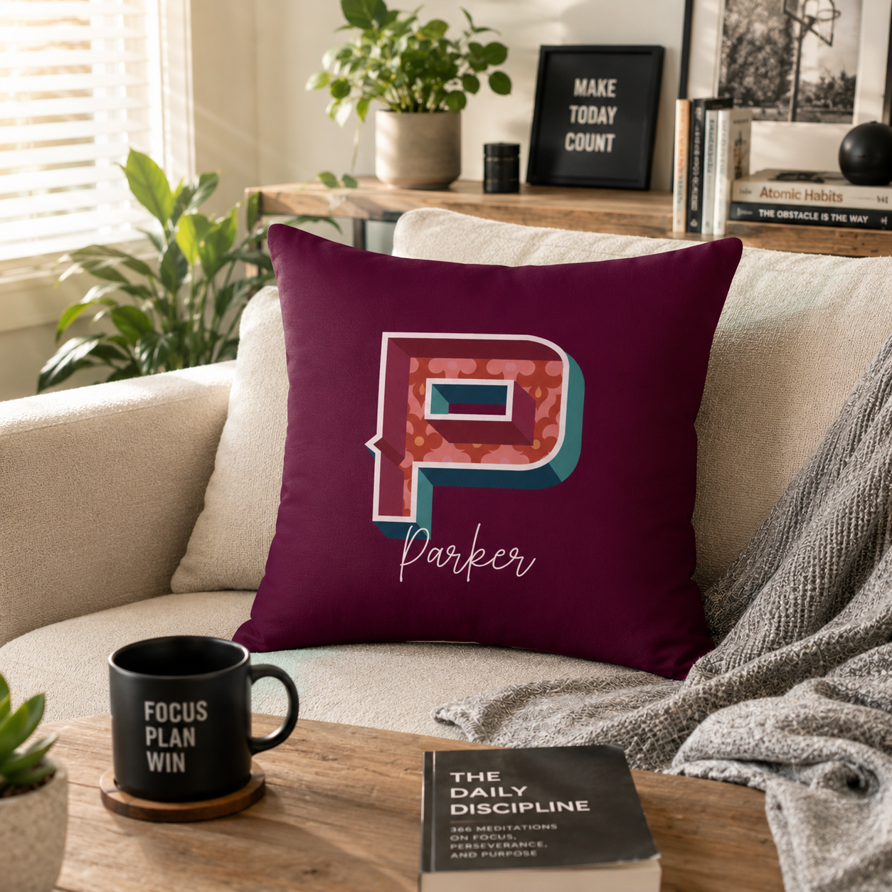 Initial P pillow for him – front view on couch