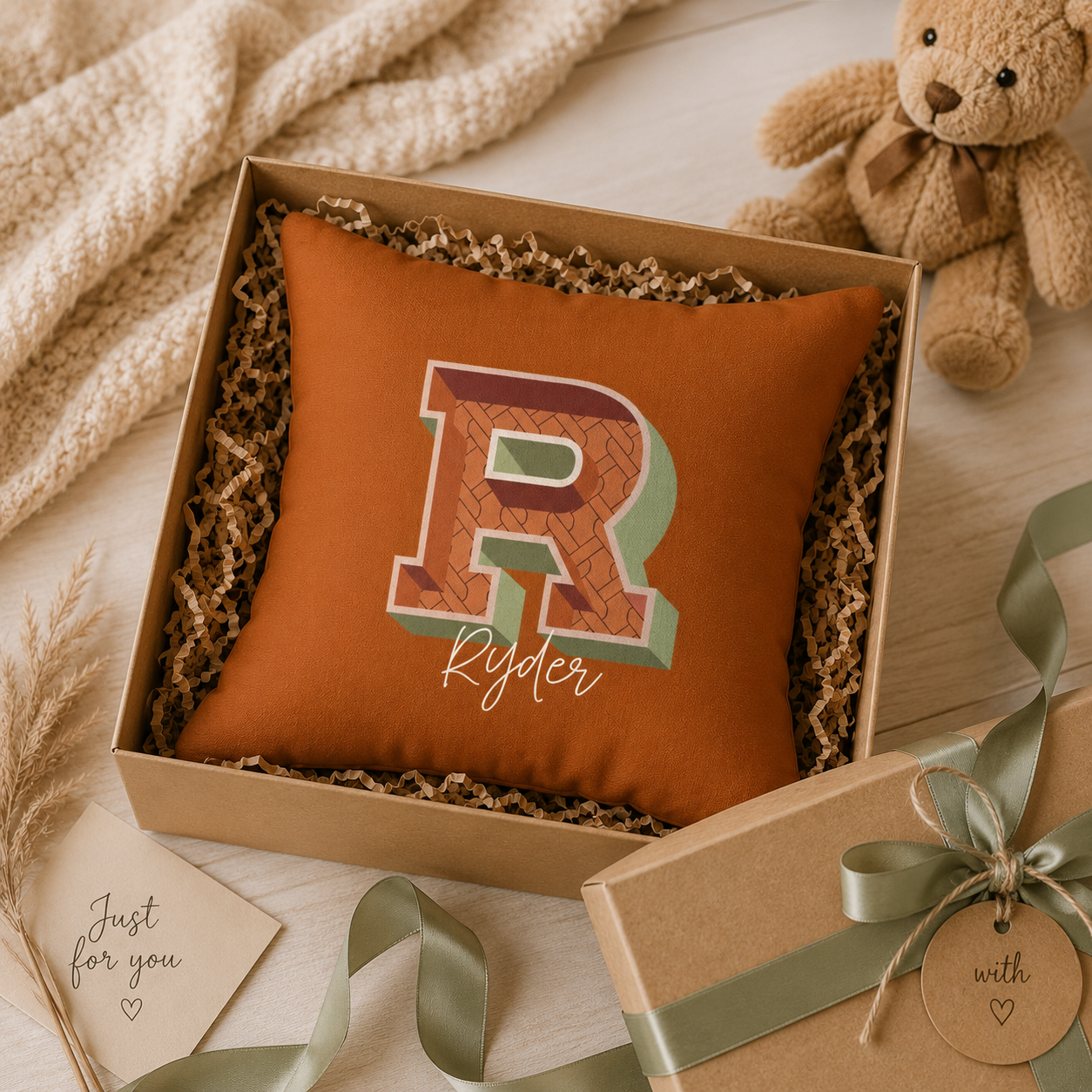 Close-up of retro R initial with gold and crimson pattern detail
