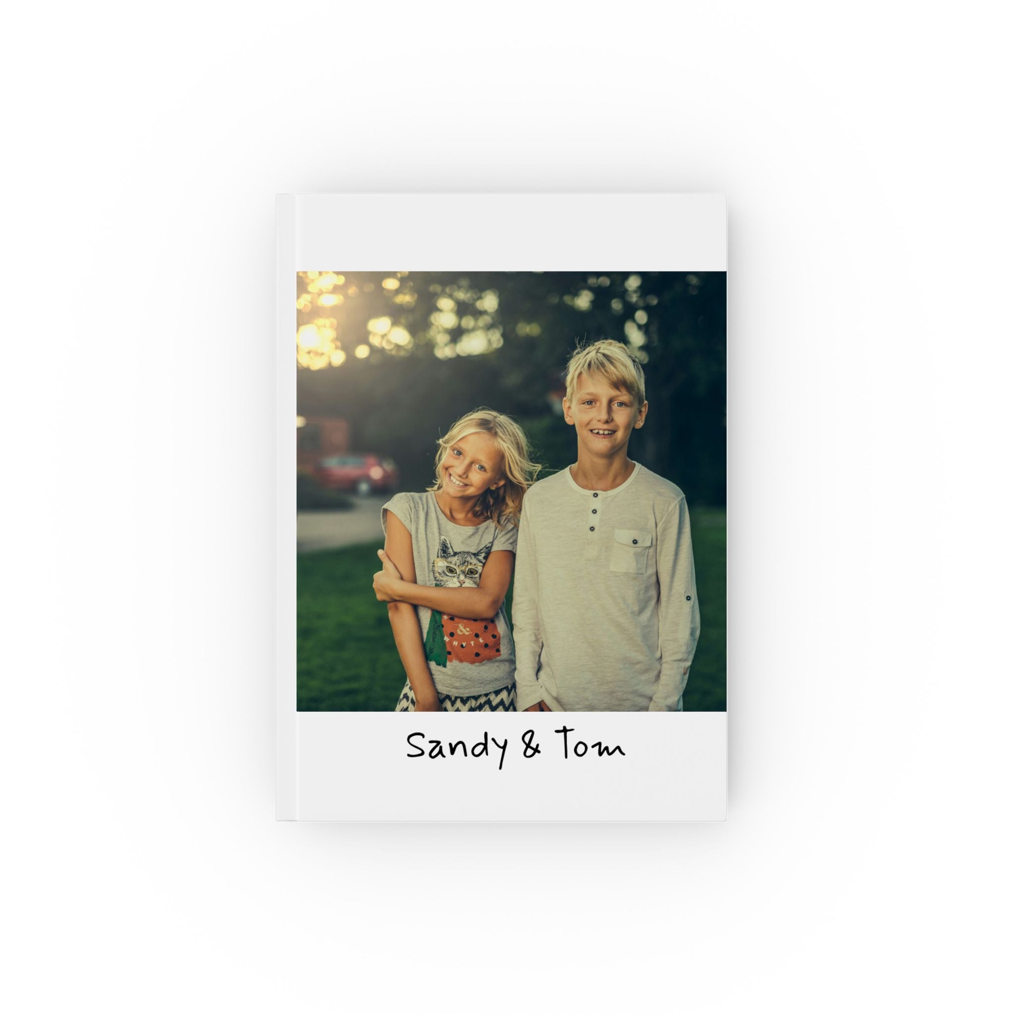 Personalized kids photo journal – white hardcover with children photo and names Sandy and Tom in handwritten font
