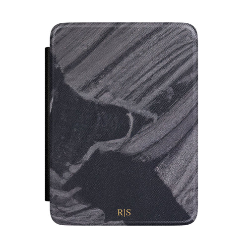 Black marble diagonal streak personalized Kindle case with gold initials, front view