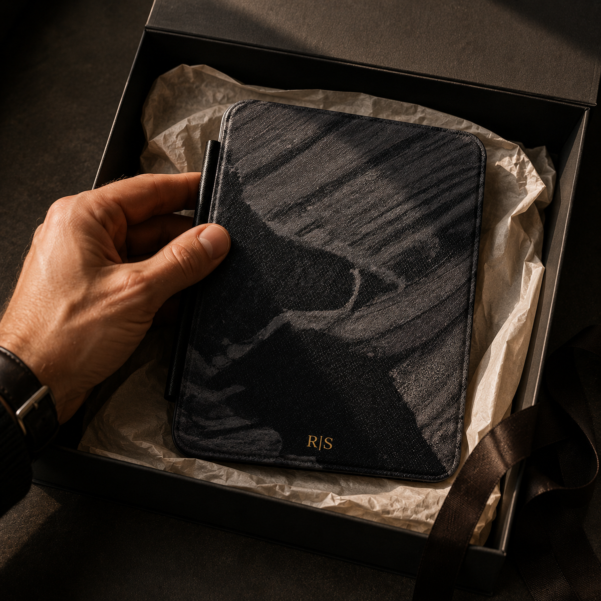 Open interior of the black marble diagonal Kindle case showing the fabric lining and TPU shell
