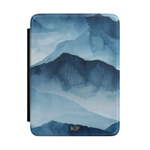 Blue watercolor mountain personalized Kindle case with gold initials, front view