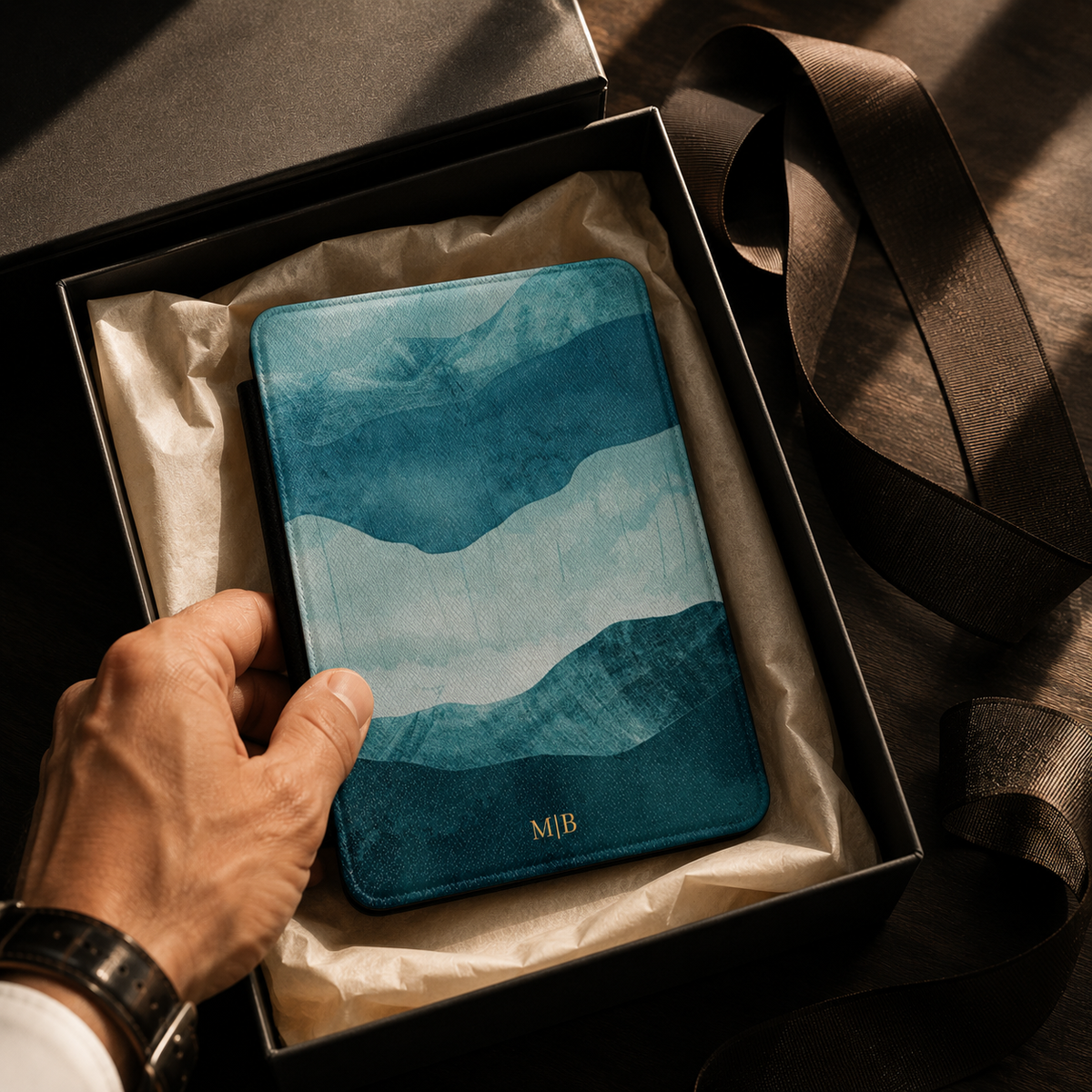 Open interior of the layered blue mountain Kindle case showing the fabric lining and TPU shell