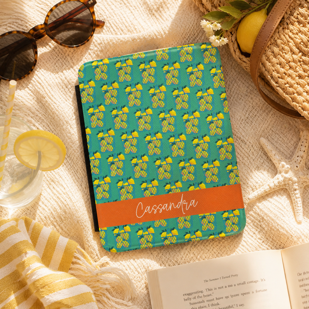 Personalized lemon basket print Kindle case styled in a lifestyle reading setting