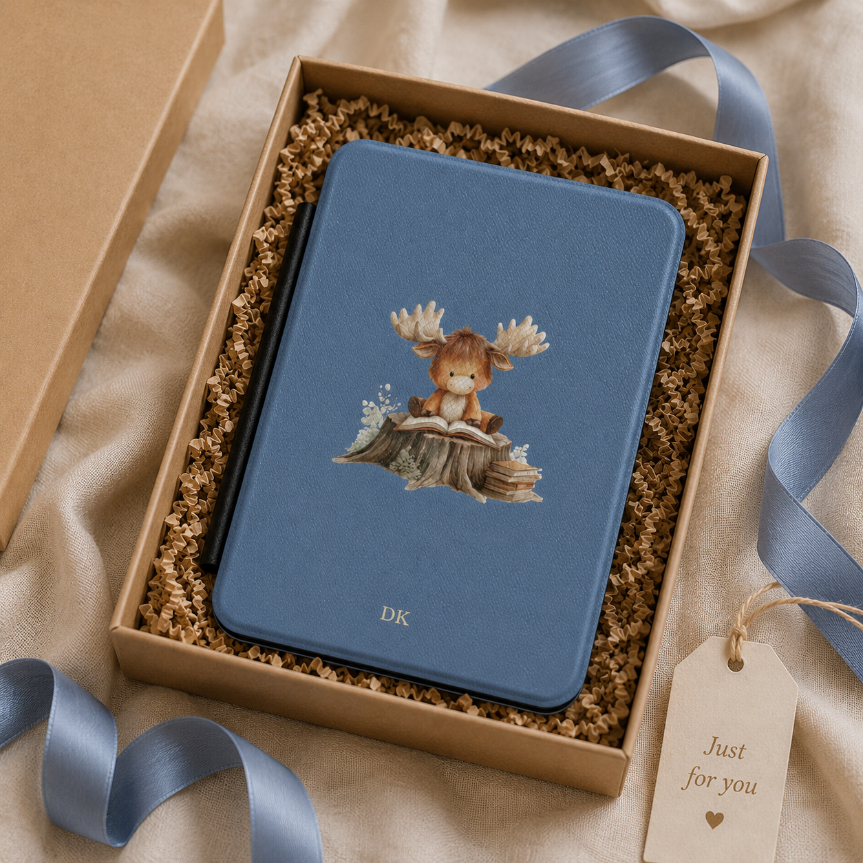 Personalized reading moose Kindle case shown in a gift setting