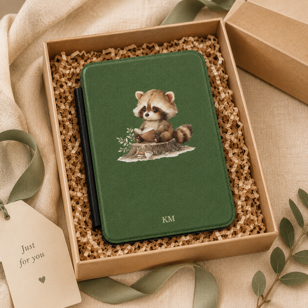 Personalized reading raccoon Kindle case shown in a gift setting