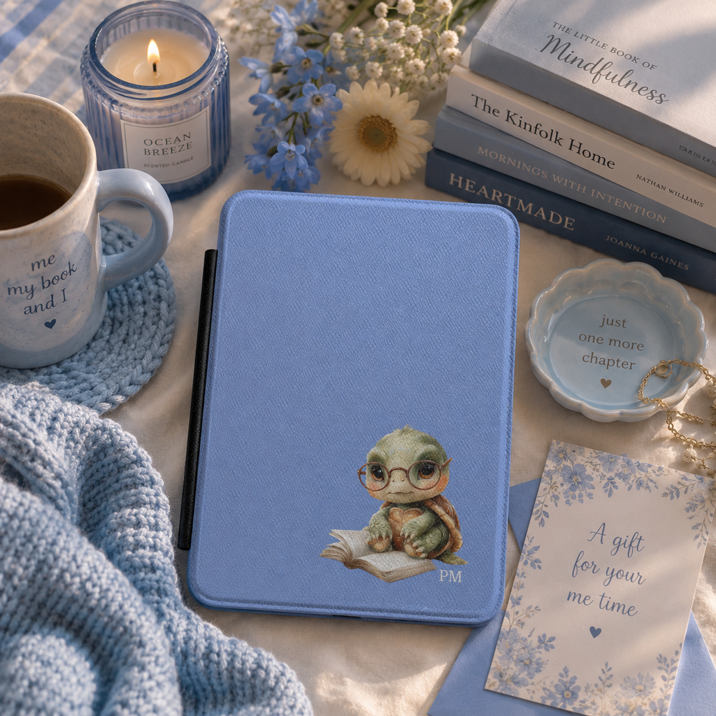 Personalized reading turtle Kindle case styled in a lifestyle reading setting