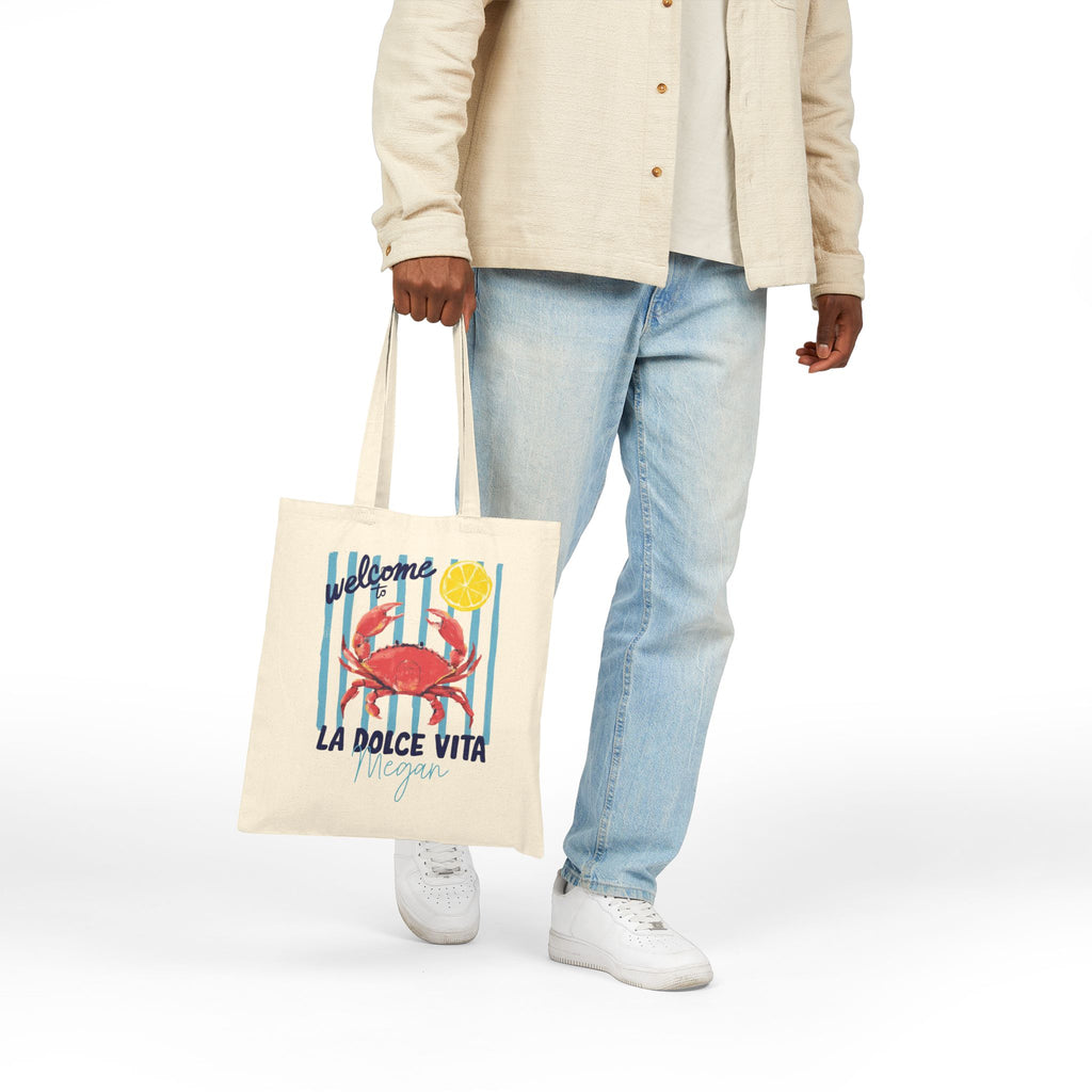 Close-up of crab print and custom name on canvas tote bag