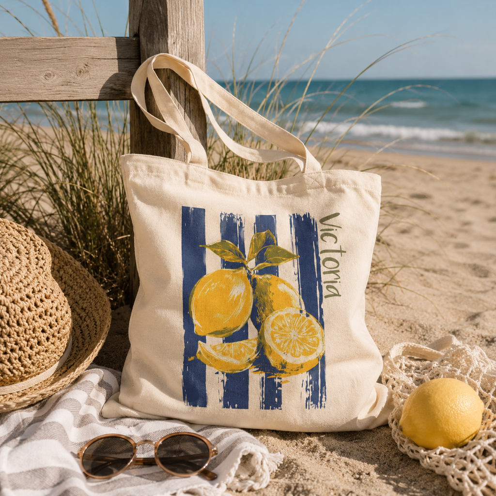 Close-up of lemon branch print and custom name on canvas tote bag