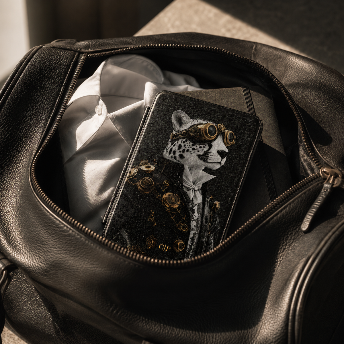 Personalized Leopard Kindle case black Saffiano leatherette back cover shown in a black leather travel bag