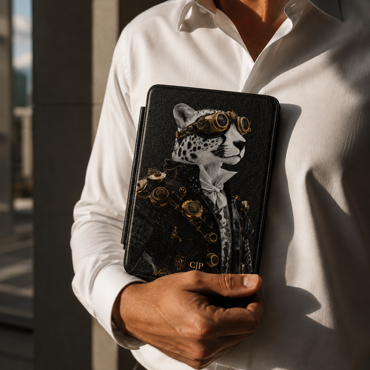 Personalized Leopard Kindle case held in hand in front of white t-shirt