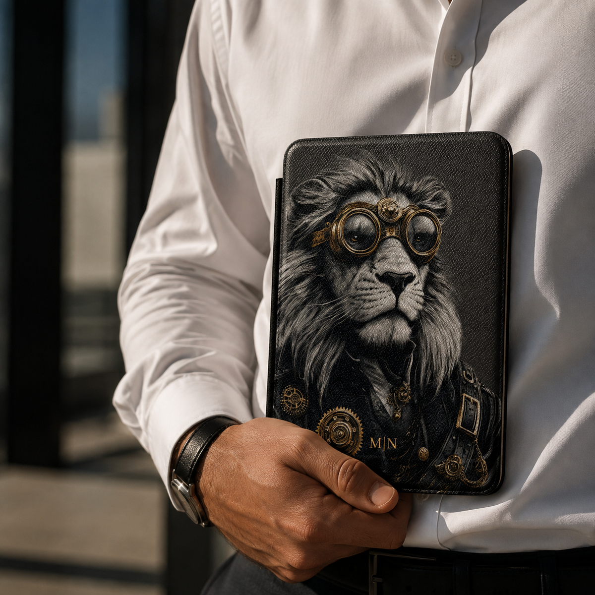 Personalized Lion Kindle case held in hand in front of white shirt
