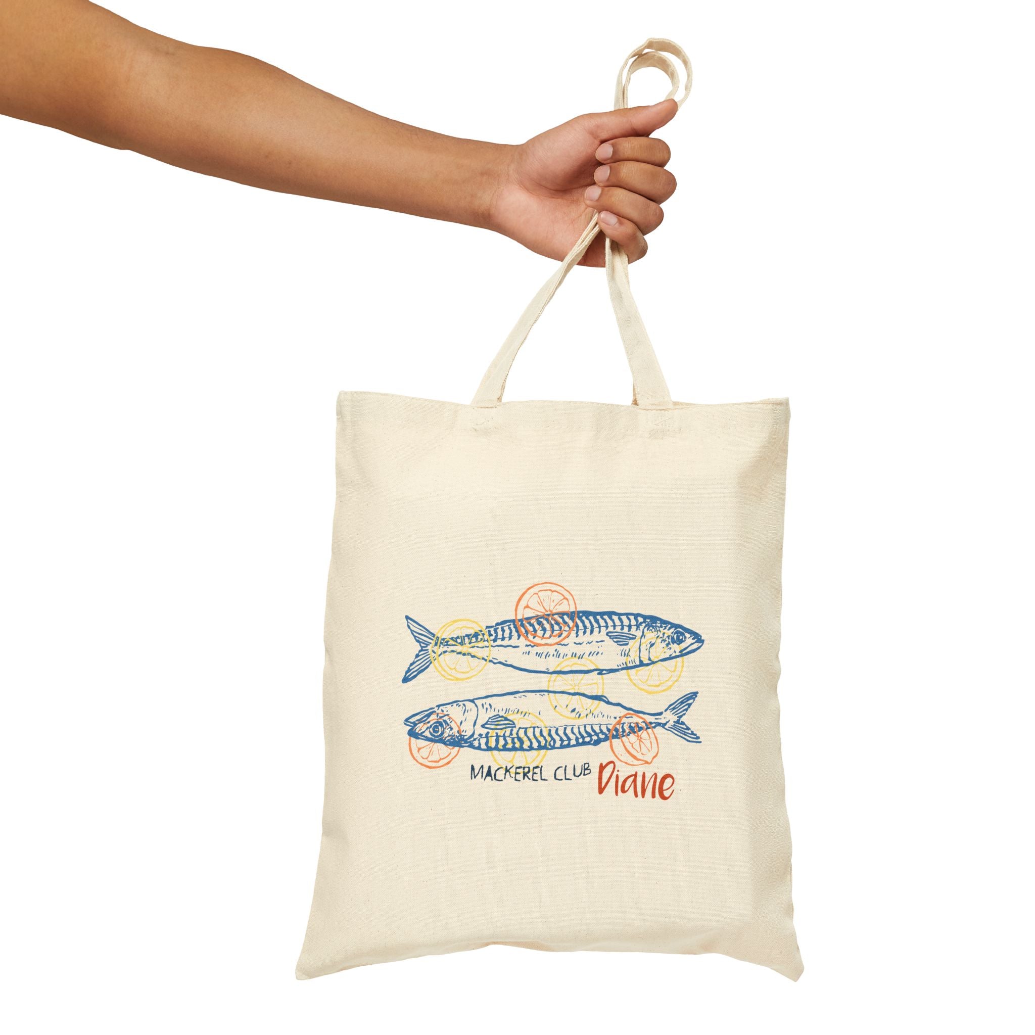 Personalized mackerel club canvas tote bag styled in a home setting