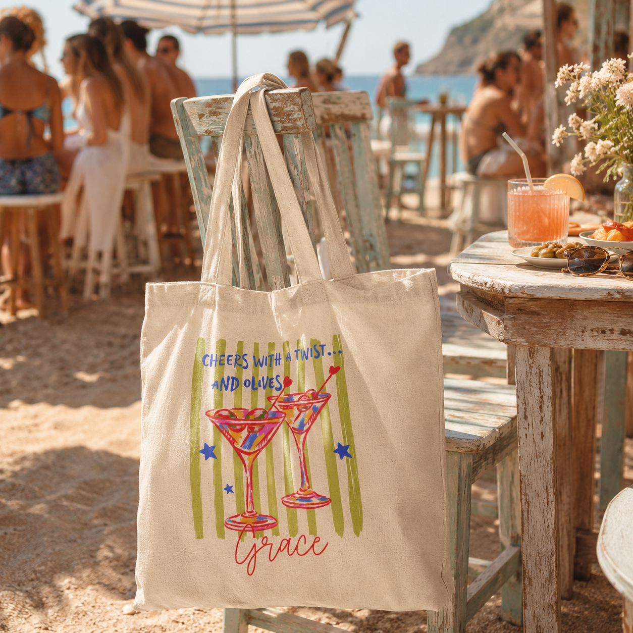 Close-up of martini glasses print and custom name on canvas tote bag