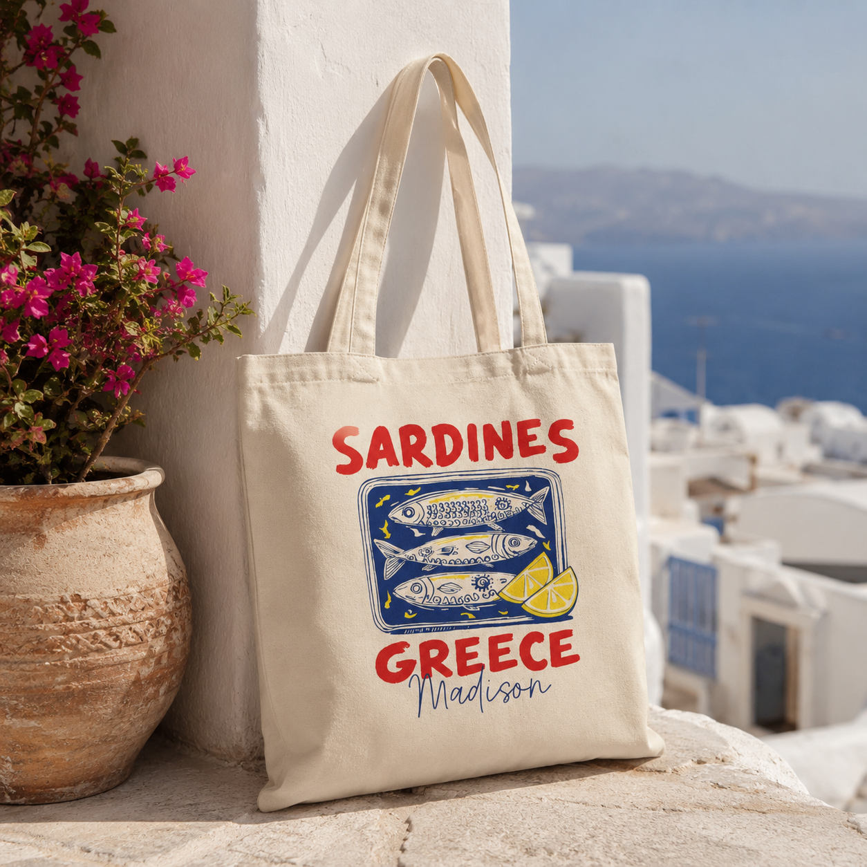 Close-up of sardines tin print and custom name on canvas tote bag