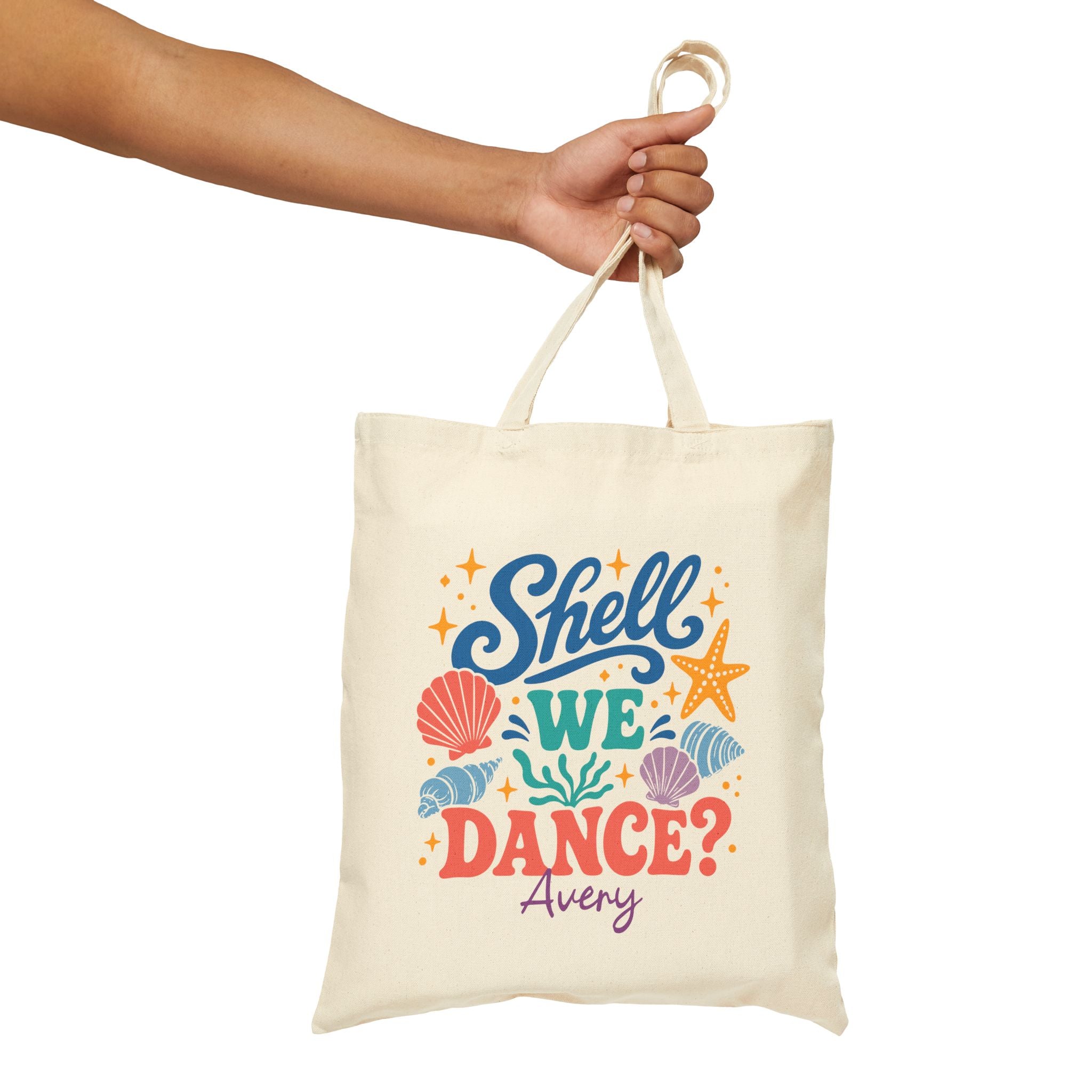 Personalized shell we dance canvas tote bag styled in a home setting