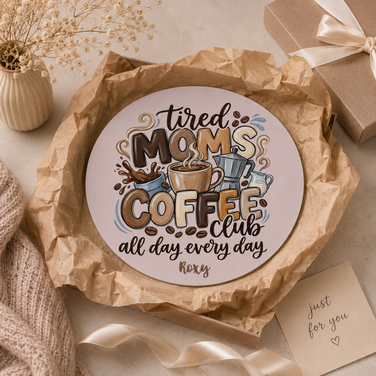 Close-up of neoprene texture and stitched edge on tired moms coffee mouse pad