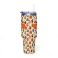 Personalized 40oz tumbler with Halloween pumpkin medley design, custom name